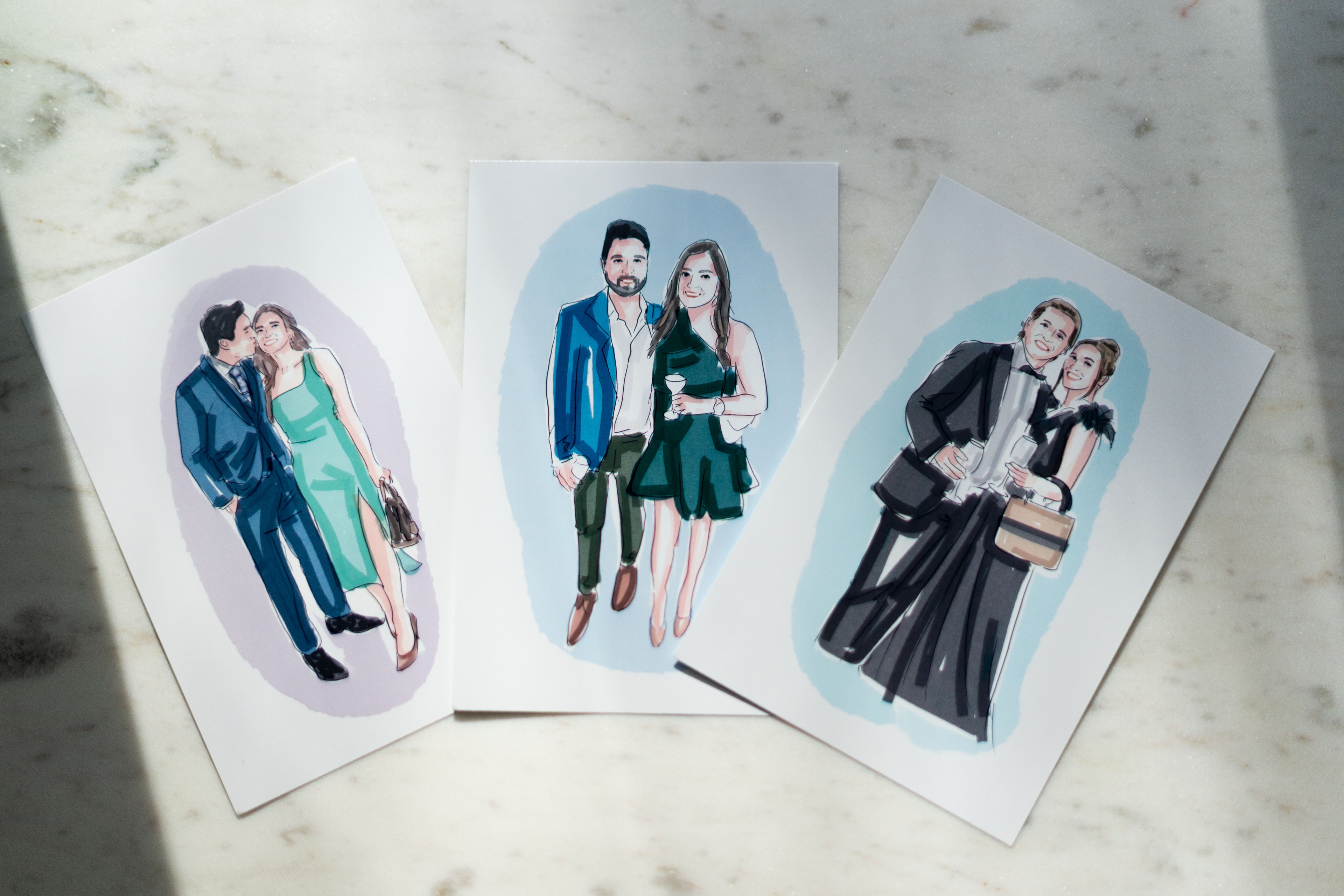 Live guest couple illustration display on marble table